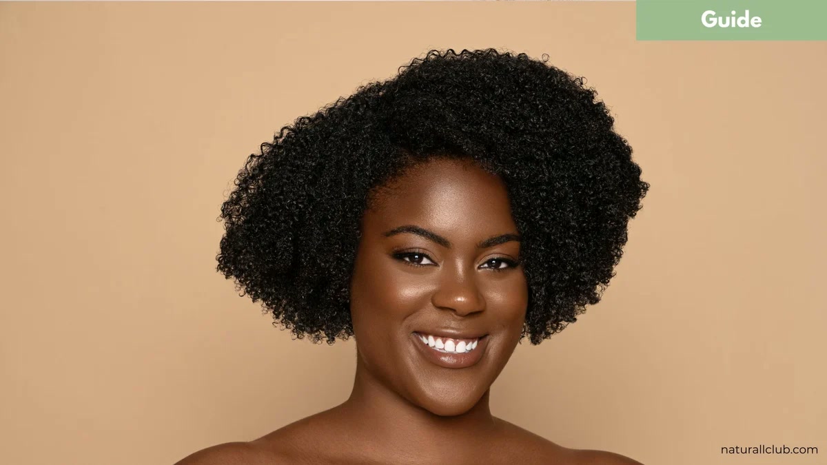 Commercial beauty portrait of a model with glowing skin and curly hair