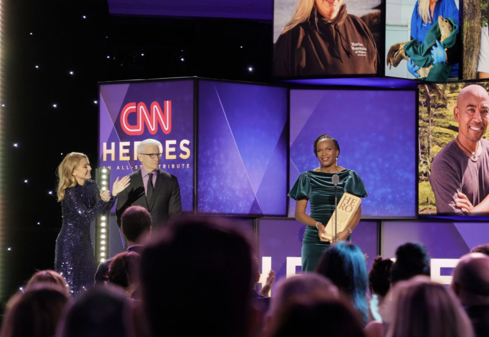 Broadcast still of talent on stage at the CNN Heroes All-Star Tribute