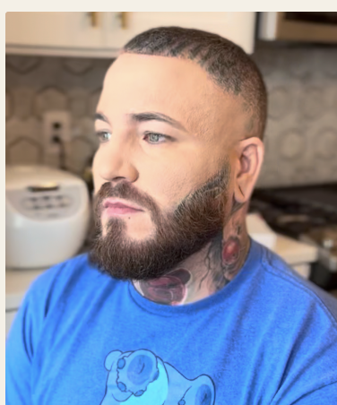 Client with neck tattoos before professional makeup coverage