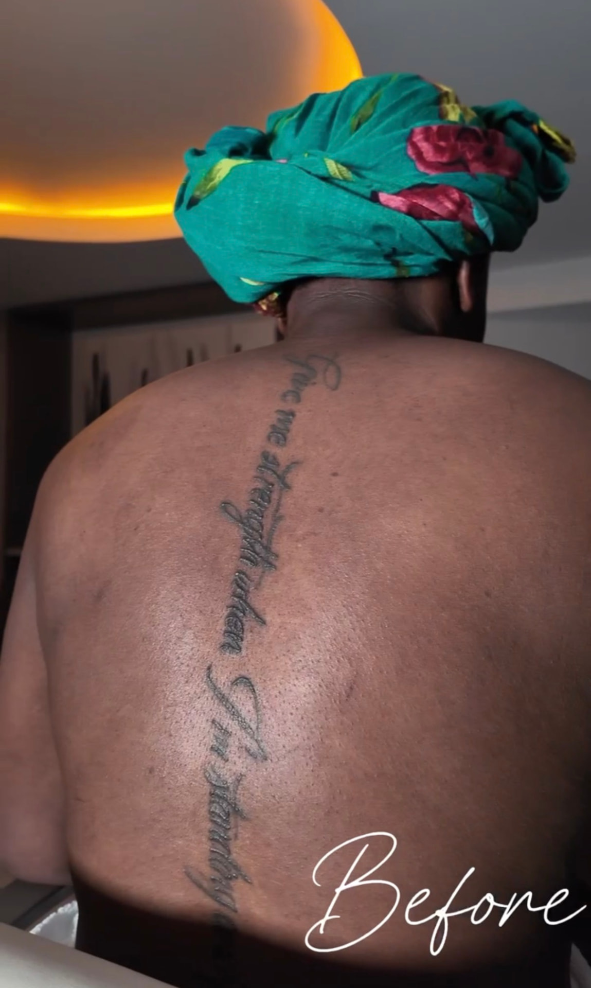 Back script tattoo before makeup coverage
