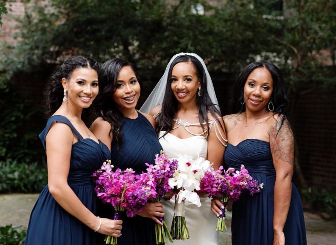 Bride with her bridal party, coordinated wedding day makeup