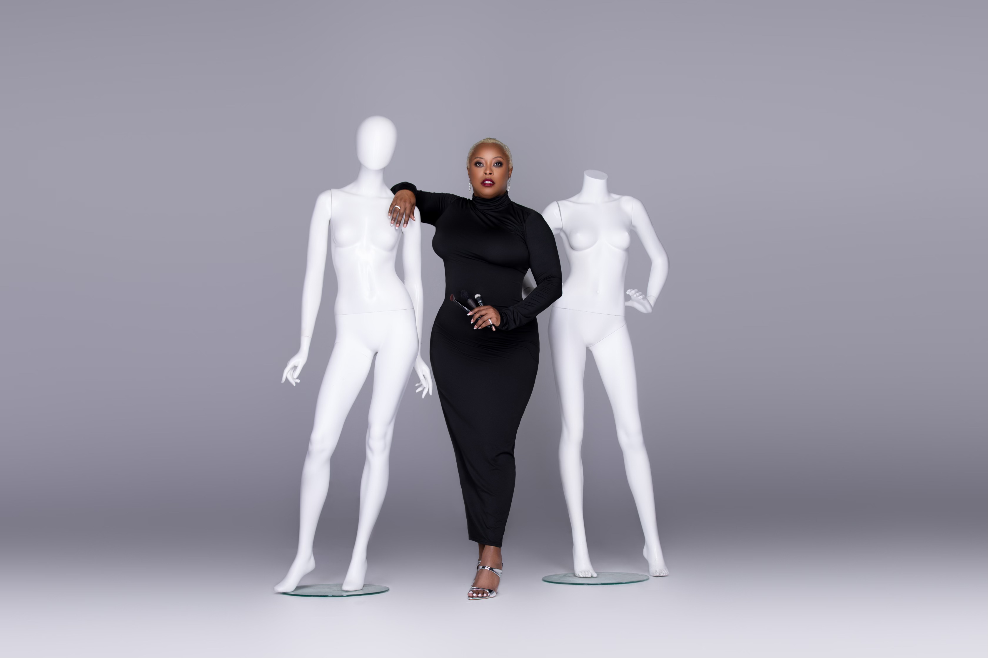 Joelle Phillips in studio with makeup brushes