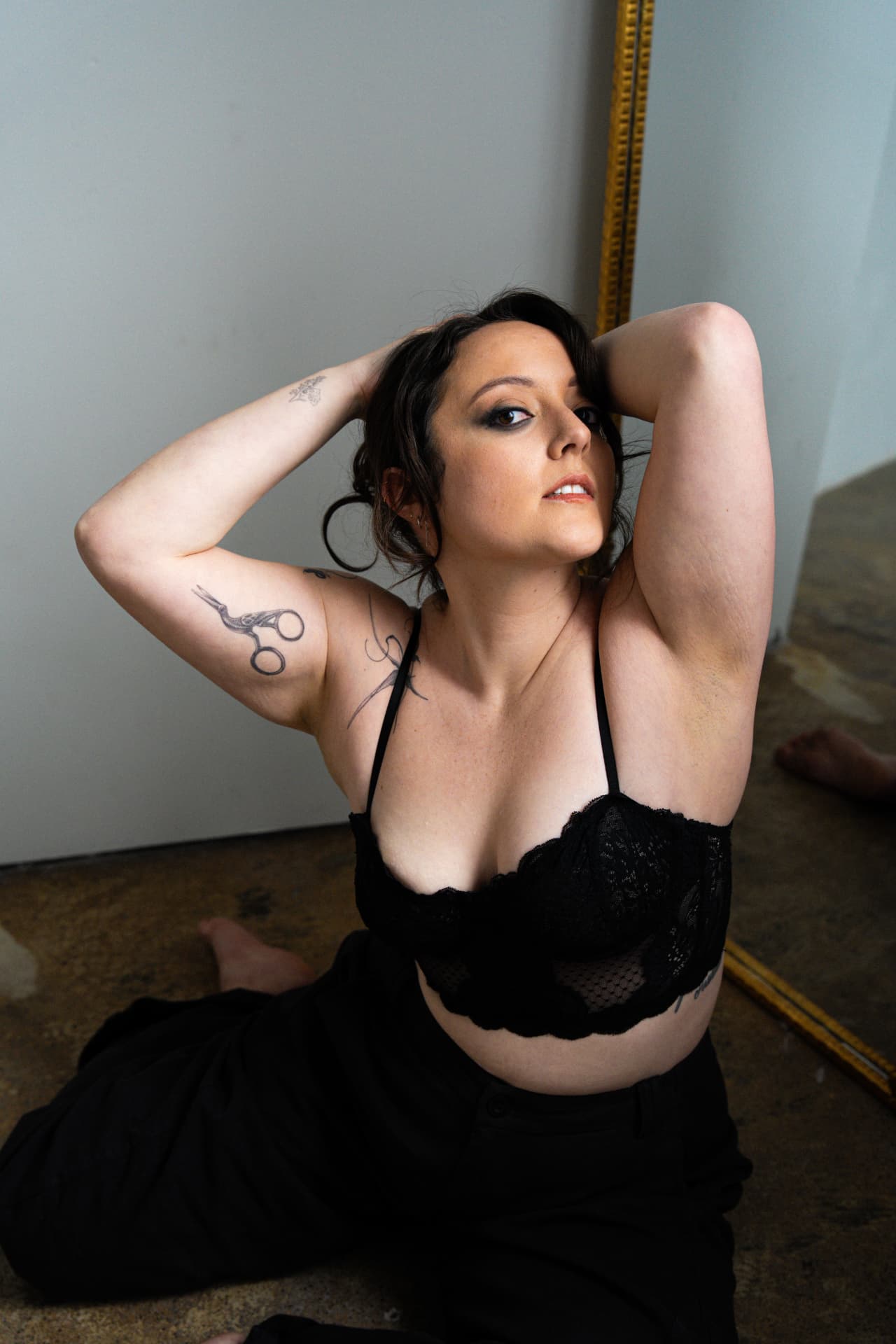 Editorial intimates portrait with soft matte skin and defined eyes
